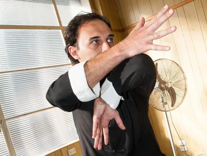 Adult student demonstrating a dragon elbow guard