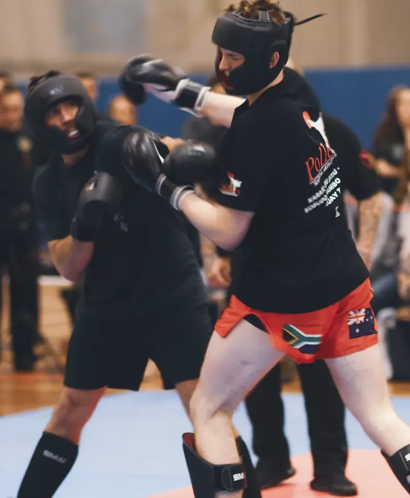 Wu Xing Dao student landing a heavy punch at the Central Coast Open competition