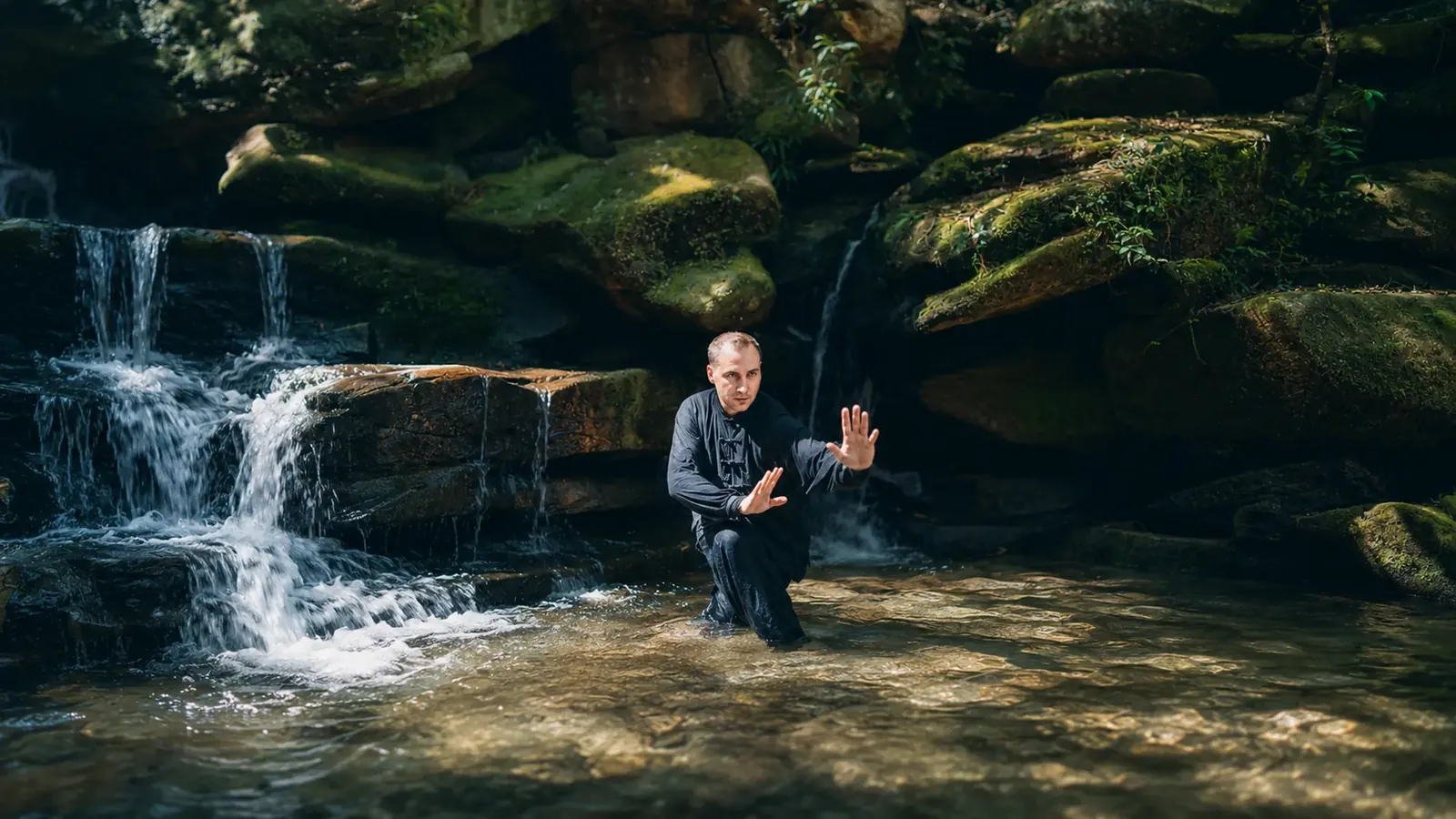 Xing Yi Quan internal stance practice beside a waterfall