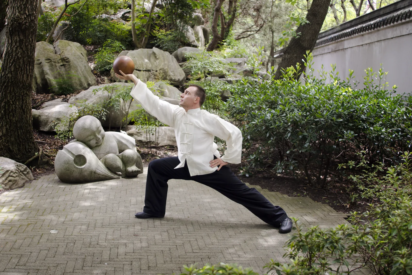 Taiji Ball Qigong in a garden.